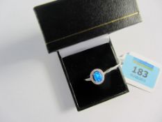 Blue opal and cubic zirconia cluster ring stamped 925