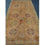 Persian beige ground rug 280cm x 132cm