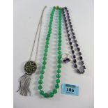 Green bead necklace with hallmarked 9ct gold clasp,