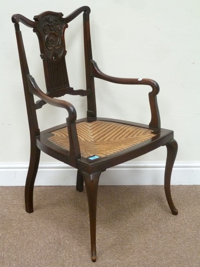 Edwardian mahogany elbow chair with string seat
