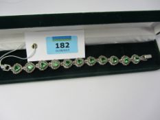 Flower link bracelet set with green stones stamped 925