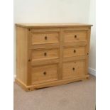 Solid pine chest fitted with six drawers,