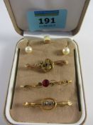 Three Edwardian brooches tested to 9ct and a pair of later pearl ear-rings stamped 9ct