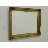 Gilt framed bevelled edge wall mirror,