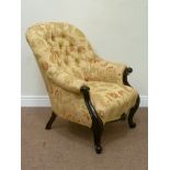 Victorian carved mahogany armchair upholstered in pale gold patterned fabric,