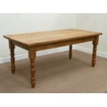 Solid waxed pine refectory table on turned base, 91cm x 183cm,