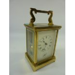 Mid 20th century French brass cased carriage clock with alarm striking the hour on single gong H18.