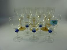 Set of six wine glasses with blue knop stems and another set of six glasses