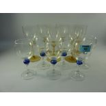 Set of six wine glasses with blue knop stems and another set of six glasses