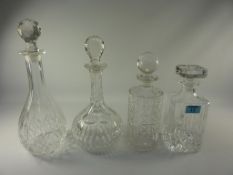 Four cut crystal decanters H33cm diminishing
