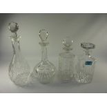 Four cut crystal decanters H33cm diminishing