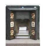 Victorian cast iron fireplace insert with original tiles,