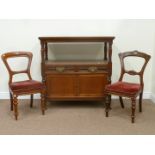 Edwardian walnut two tier dumb waiter fitted with two drawers and cupboards, W107cm,