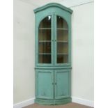 Green painted floor standing bow front corner display cabinet,
