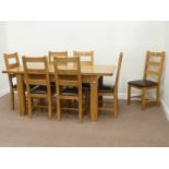 Light oak extending dining table (L140cm x W90cm) with fold out leaf (L180cm) and seven chairs