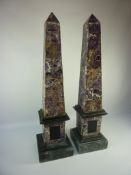 Pair of amethyst and black marble obelisks 73cm Condition Report 18cm wide,