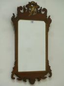 Early 20th century mahogany fretwork Chippendale style mirror with Griffin pediment,