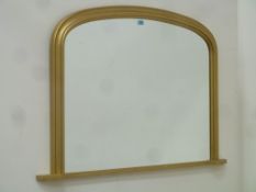 Arch top overmantle mirror in gilt frame L125cm