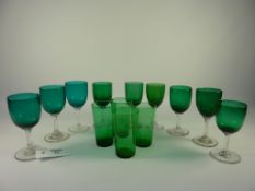 Nine wine glasses with green/turquoise bowls and clear stems and four green glass tumblers (13)