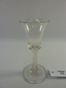 18th century wine glass with bell shaped bowl and opaque cotton twist stem H16cm