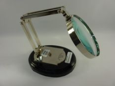 Magnifying glass on stand