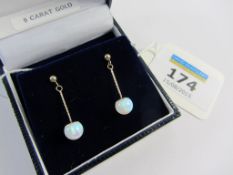 Pair of opal drop ear-rings stamped 375