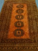 Persian Bokhara golden ground rug 200cm x 112cm