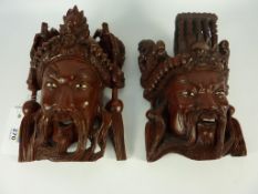 Pair mid 20th century Chinese wall face masks H20cm