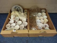 Commemorative ceramics and glassware in two boxes