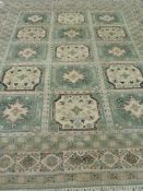 Moroccan green and beige ground rug,