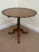 Georgian style reproduction mahogany pedestal table with carved scallop border,