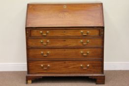 George III mahogany fall front bureau fitted with four graduating drawers,