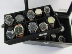 Collection of twenty military style and other wristwatches in display case