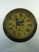 Railwayana - Small Edwardian century single fusee wall clock, the white enamel dial named 'G.N.R.