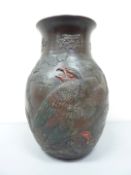 Japanese Meiji period terracotta vase with raised bird of prey decoration, impressed marks to base