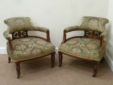 Pair Victorian walnut framed tub shaped armchairs upholstered in green patterned fabric,