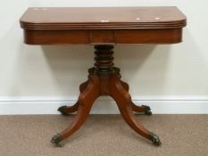 Victorian mahogany swivel fold over top tea table on turned pedestal and four splay leg base,