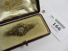 Victorian gold bar brooch set with nine diamonds hallmarked 15ct