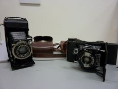 Zeiss Ikon camera with Compur-Rapid shutter and a Kershaw Eight-20 Penguin camera (2)