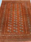 Persian Bokhara rust ground rug,