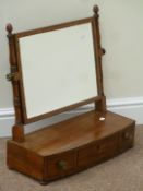 Georgian mahogany toilet mirror fitted with three drawers,