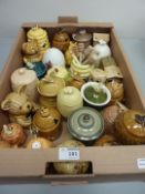 Collection of honey pots in one box