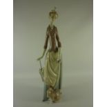 Lladro figure of a lady with dog and umbrella H36cm