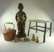 Fireside companion stand in the form of a boy, copper kettle, brass trivet and four brass