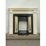 Edwardian fireplace - cast iron fire inset with tiles in painted wood surround on later granite