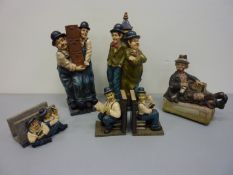 Two Laurel and Hardy bottle holders both approx.
