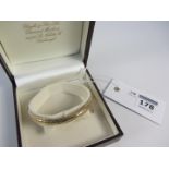 Gold hinged bangle hallmarked 9ct approx 8gm