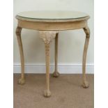 Early 20th century circular bleached mahogany occasional table on ball and claw legs with carved