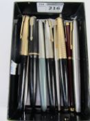 Collection of Parker fountain pens including two with 14k nibs and two others