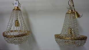 Near pair of gilt metal chandeliers with cut crystal drops approx.